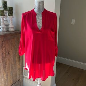 All In Favor polyester blouse with front pocket and adjustable sleeves